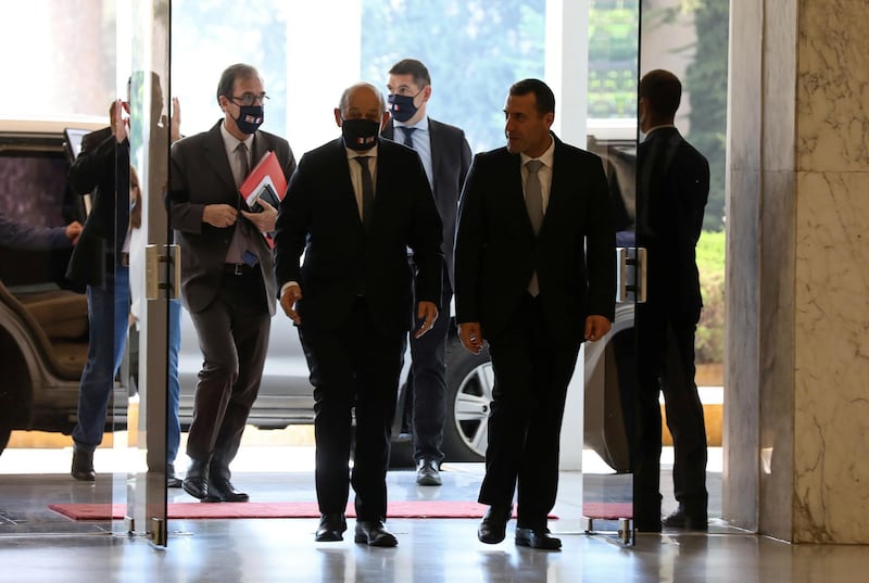 French Foreign Minister Jean-Yves Le Drian arrives at Baabda Palace to meet Lebanon’s President Michel Aoun. Reuters