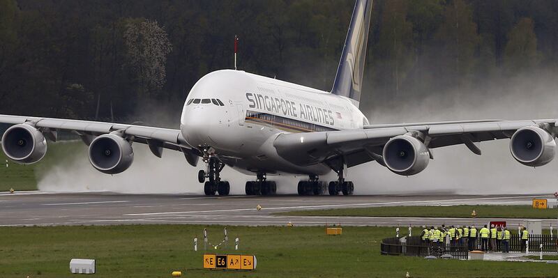 A Singapore Airlines Airbus A380-841 takes off from Zurich airport, Switzerland. The carrier's profits have taken a hit. Arnd Wiegmann / Reuters