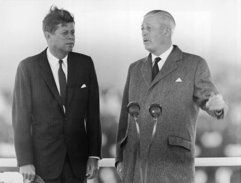 British Prime Minister Harold Macmillan, right, welcomes US President John F Kennedy at Gatwick Airport in 1963