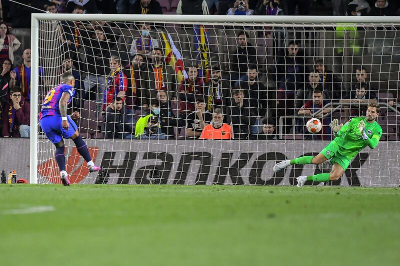 Memphis Depay scores from the penalty spot to make it 2-3, but far too late to rescue Barca. AFP