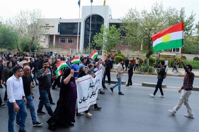 The protest drew about 400 people, who waved the flag of Iraqi Kurdistan. AFP