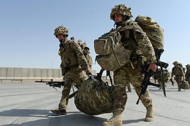 UK forces will withdraw from Afghanistan before September. AFP 