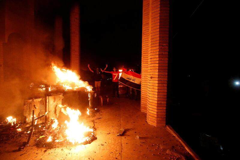 Some protesters clashed with security forces, lobbing Molotov cocktails and setting fire to a government building. Reuters