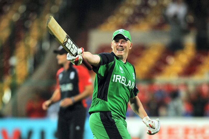 Ireland's cricketer Kevin O'Brien celebrates after scoring a century (100 runs) during the ICC Cricket World cup match between England and Ireland at The M.Chinnaswamy Stadium in Bangalore on March 2, 2011. AFP PHOTO/ DIBYANGSHU SARKAR / AFP PHOTO / DIBYANGSHU SARKAR