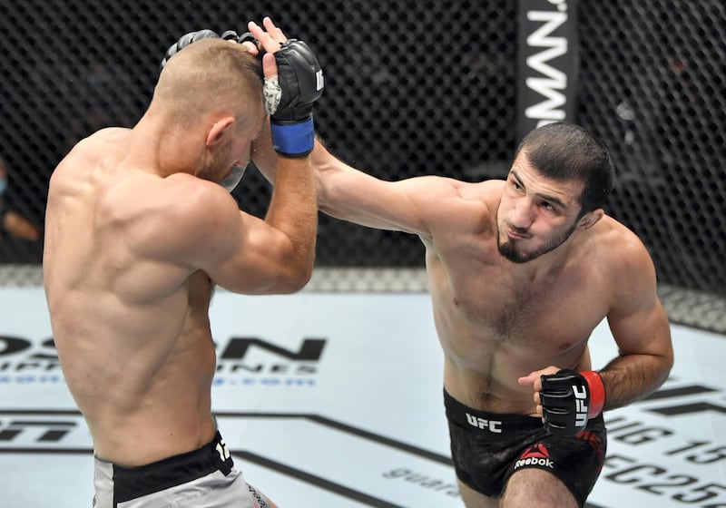 ABU DHABI, UNITED ARAB EMIRATES - JULY 26: (R-L) Ramazan Emeev of Russia punches Niklas Stolze of Germany in their welterweight fight during the UFC Fight Night event inside Flash Forum on UFC Fight Island on July 26, 2020 in Yas Island, Abu Dhabi, United Arab Emirates. (Photo by Jeff Bottari/Zuffa LLC via Getty Images) *** Local Caption *** ABU DHABI, UNITED ARAB EMIRATES - JULY 26: (R-L) Ramazan Emeev of Russia punches Niklas Stolze of Germany in their welterweight fight during the UFC Fight Night event inside Flash Forum on UFC Fight Island on July 26, 2020 in Yas Island, Abu Dhabi, United Arab Emirates. (Photo by Jeff Bottari/Zuffa LLC via Getty Images)