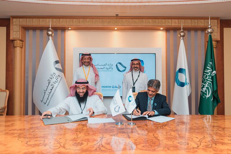 Bandar AlKhorayef, Saudi Arabia's Minister for Industry and Mineral Resources, and Nadhmi Al Nasr, chief executive of Neom, witnessing the signing ceremony. Photo: Oxagon