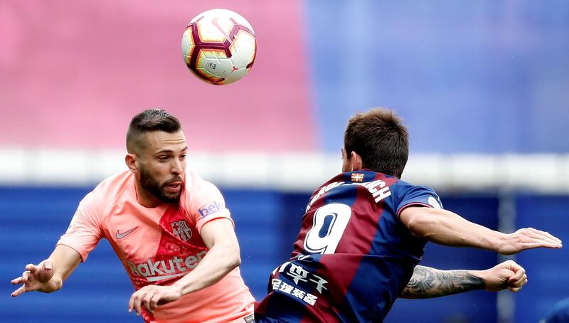 Eibar's Sergi Enrich, right, in action against FC Barcelona's Jordi Alba. EPA