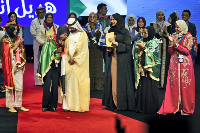 Sudanese Hadeel Anwar is comforted by Sheikh Mohammed bin Rashid as she reacts after being announced winner of the 2019 Arab Reading Challenge in Dubai, UAE, Wednesday, Nov. 13, 2019. (Photos by Shruti Jain - The National)