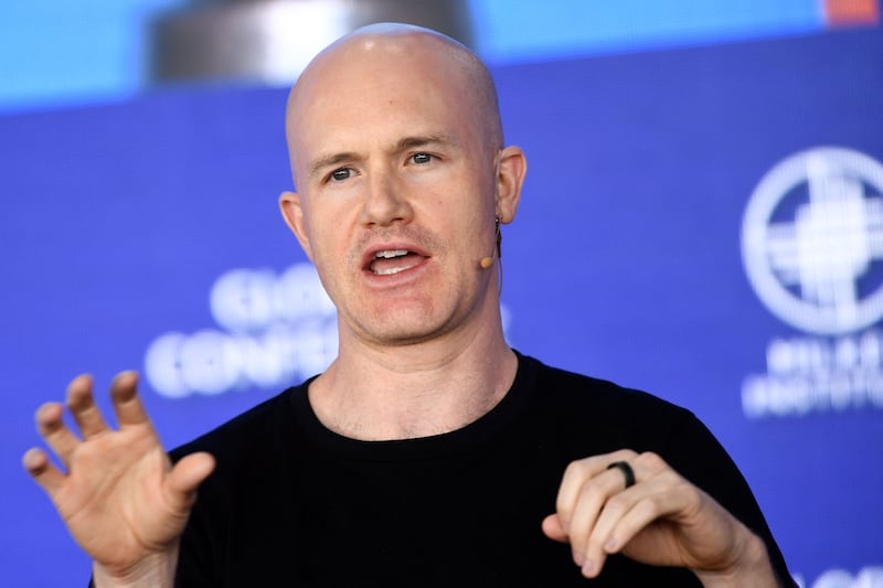 Brian Armstrong, chief executive and co-founder of Coinbase, said the company decided to reduce the size of its team by 18 per cent to stay healthy during the economic downturn. AFP
