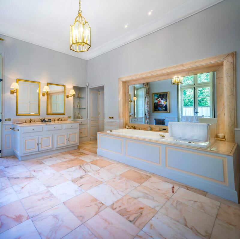 A spacious bathroom, complete with a whirlpool bath. Courtesy Chateau De Tourreau