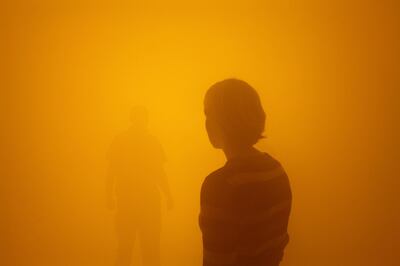 A woman stands in Eliasson's fog-filled installation, where the visibility is only 1.5 meters. Titled Din blinde passager (Your blind passenger), 2010. Photo: Supplied