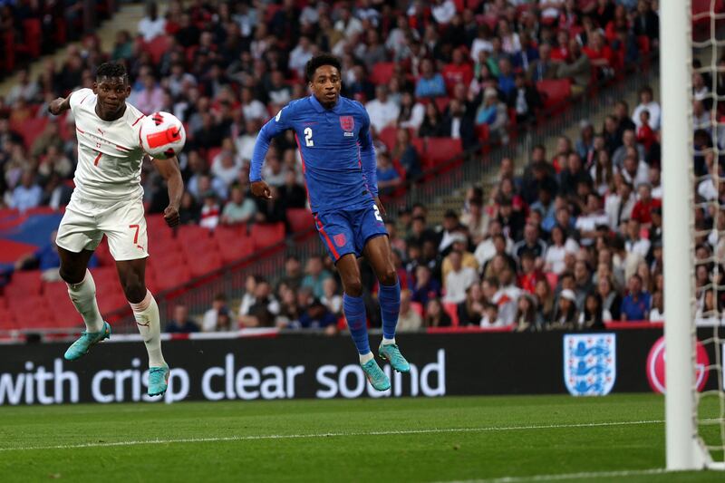 Striker Breel Embolo heads Switzerland ahead at Wembley. 
AFP