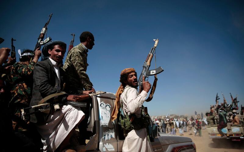 FILE - In this Jan. 3, 2017, file photo, newly recruited Shiite fighters, known as Houthis, mobilize to fight pro-government forces, in Sanaa, Yemen. Roadside bombs disguised as rocks in Yemen bear similarities to others used by Hezbollah in southern Lebanon and by insurgents in Iraq and Bahrain, suggesting at the least an Iranian influence in their manufacturing, a report released Monday, March 26, 2018, by Conflict Armament Research alleges. The report comes comes as the West and United Nations researchers accuse Iran of supplying arms to  Houthis, who have held the countryâ€™s capital since September 2014. (AP Photo/Hani Mohammed, File)