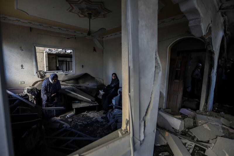People inspect their homes in Rafah for damage done by  Israeli air strikes. UN Secretary General Antonio Guterres criticised the collective punishment of Palestinians. Getty images