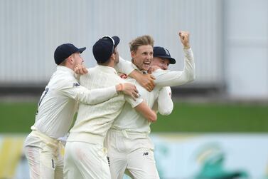 PORT ELIZABETH, SOUTH AFRICA - JANUARY 19: England captain Joe Root celebrates with team mates after taking the wicket of Rassie van der Dussen during Day Four of the Third Test between South Africa and England at St George's Park on January 19, 2020 in Port Elizabeth, South Africa. (Photo by Stu Forster/Getty Images)