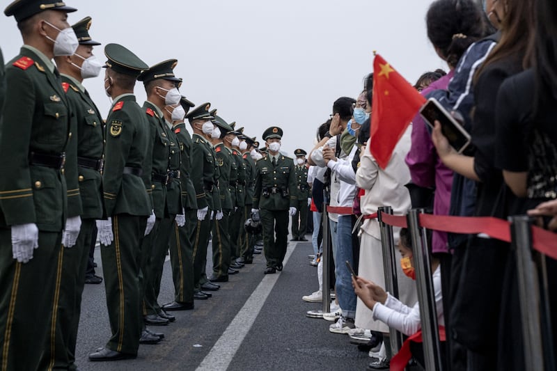 Soldiers of China's People's Liberation Army at a  ceremony to mark National Day in Beijing. Bloomberg