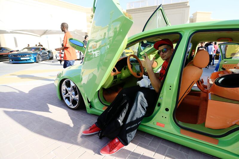 Dubai, May 31, 2013 - Khalfan Hassan is photographed with his custom 2000 Honda Accord at the Fast and Furious "Extreme Car Park" event at Studio City in Dubai, May 31, 2013. (Photo by: Sarah Dea/The National)

