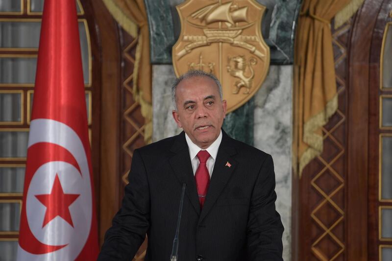 Tunisia's Prime Minister-designate Habib Jemli announces the formation of his government during a press conference at the presidential palace in Carthage, east of the capital Tunis, on January 1, 2020. / AFP / Fethi Belaid
