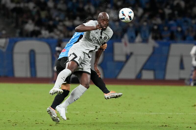 PSG's Danilo Pereira heads the ball during the friendly in Tokyo. AP