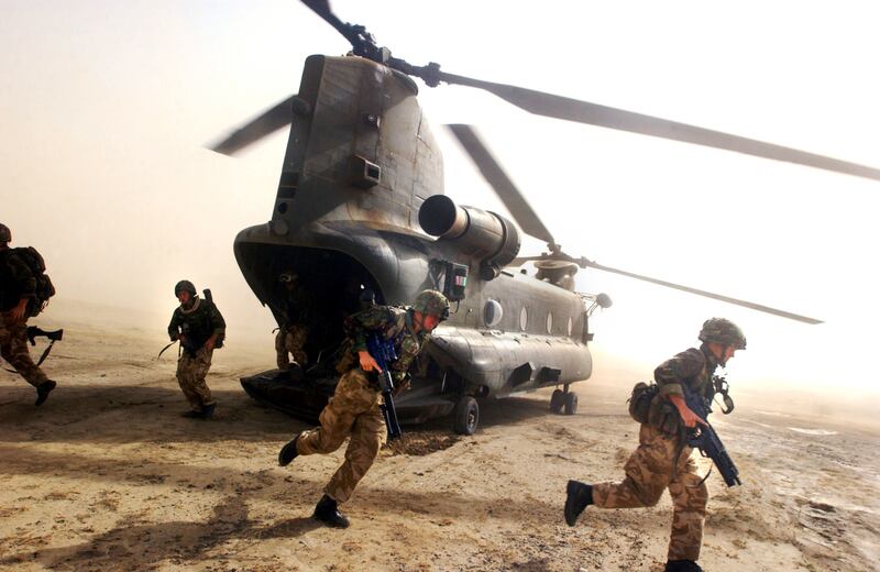 British Royal Marines exit a Chinook helicopter in south-eastern Afghanistan. UK Chief of the Defence Staff Gen Sir Nick Carter said the Taliban were 'very cunning, ruthless and innovative'. Getty