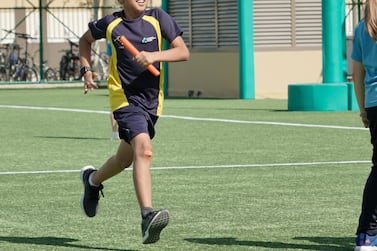 A pupil runs in the outdoor field at Dubai's Fairgreen International School. Courtesy: Fairgreen International School