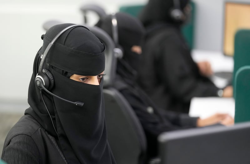 Saudi policewomen receive calls at the the Saudi National Center for Security Operations, 911, ahead of the Hajj pilgrimage in the Muslim holy city of Mecca, Saudi Arabia, Saudi Arabia, Monday, July 4, 2022.  (AP Photo / Amr Nabil)