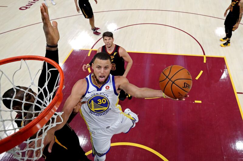 Golden State Warriors guard Stephen Curry shoots the ball against Cleveland Cavaliers forward LeBron James. Kyle Terada / Reuters