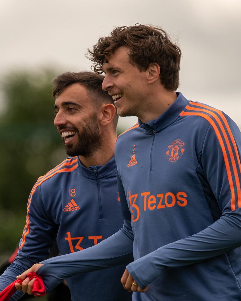 Bruno Fernandes alongside Victor Lindelof at Carrington training ground in Manchester