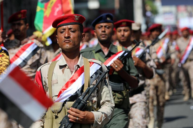 Police march during a military parade marking the anniversary of the 1962 revolution in Taez, Yemen. AFP