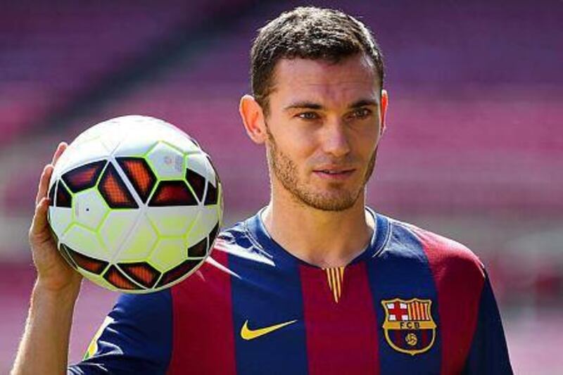 Thomas Vermaelen poses as he is unveiled as a new player for FC Barcelona at the Camp Nou stadium on August 10, 2014 in Barcelona, Spain. (Photo by David Ramos/Getty Images)