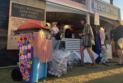 Music fans recycling at Coachella festival. AFP