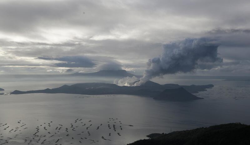 A cloud of steam comes out of Taal Volcano. AP