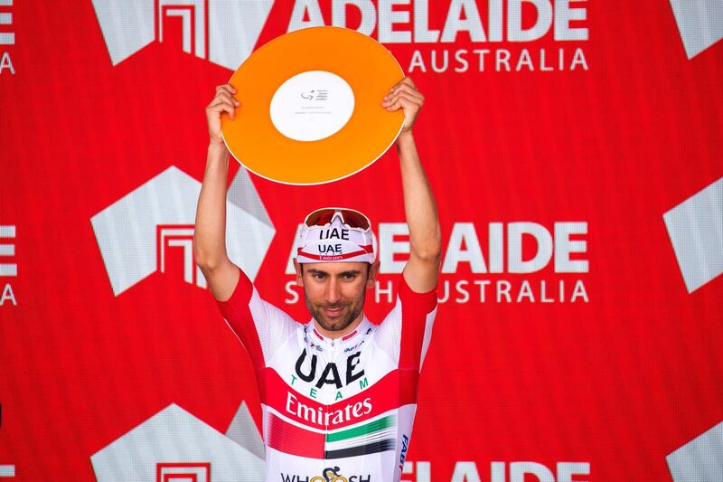 WILLUNGA HILL, AUSTRALIA - JANUARY 26: Podium / Diego Ulissi of Italy and UAE Team Emirates 2nd GC place / Celebration / Trophy / during the 22nd Santos Tour Down Under 2020, Stage 6 a 151,5km stage from McLaren Vale to Willunga Hill 374m  / TDU / @tourdownunder / #UCIWT / on January 26, 2020 in Willunga Hill, Australia. (Photo by Daniel Kalisz/Getty Images)