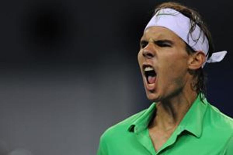 The world No 2 Rafael Nadal booked a last 16 place in the Shanghai Masters with a 6-2, 6-7, 6-4 victory over American James Blake.
