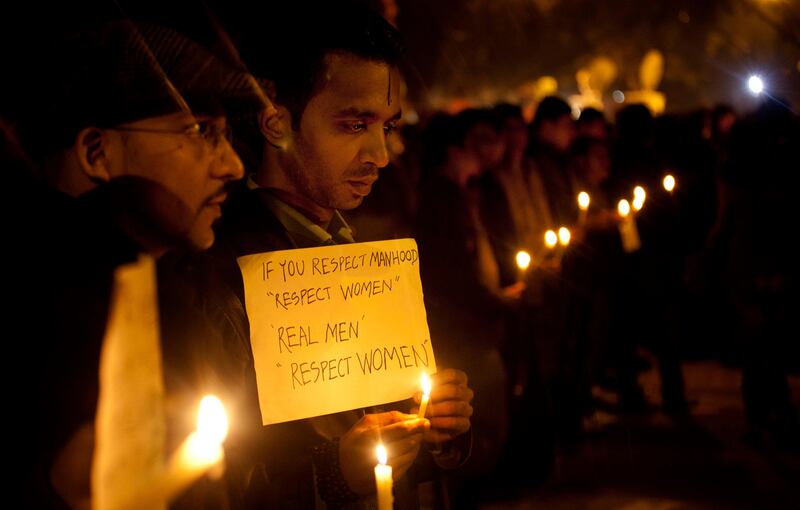 Indians participate in a candle-lit vigil to mourn the death of a gang rape victim in New Delhi, India, Sunday, Dec. 30, 2012. The woman who died after being gang-raped and beaten on a bus in India's capital was cremated Sunday amid an outpouring of anger and grief by millions across the country demanding greater protection for women from sexual violence. (AP Photo/ Dar Yasin) *** Local Caption ***  APTOPIX India Gang Rape.JPEG-01ebc.jpg