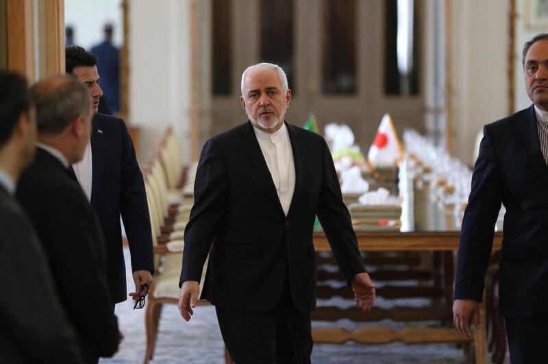 Iranian Foreign Minister Mohammad Javad Zarif arrives to meet his Japanese counterpart in Tehran on June 12, 2019. Japan's Prime Minister Shinzo Abe, the first Japanese premier to visit Iran in 41 years, is expected in Tehran for a rare diplomatic mission, hoping to ease tensions between the Islamic republic and Tokyo's key ally Washington.
 / AFP / ATTA KENARE
