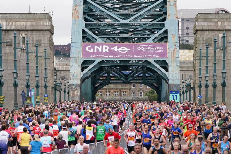 The Great North Run, which was cancelled in 2020 due to the Covid-19 pandemic, was held with several coronavirus safety measures in place, including route changes, staggered start times and hand sanitiser stations. Getty Images