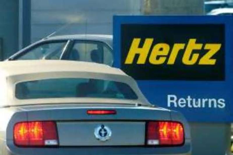 A Ford Mustang returns to an Oakland, Calif., Hertz location on Monday, Sept. 12, 2005. Hertz Corp. announced today it will sell its rental car business for $5.6 billion in cash to a private equity group composed of Clayton Dubilier & Rice, The Carlyle Group and Merrill Lynch Global Private Equity. (AP Photo/Noah Berger)