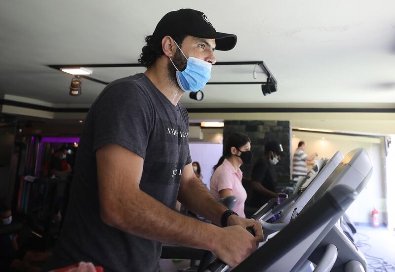 People training at a gym after its reopening in Cairo, Egypt.  EPA