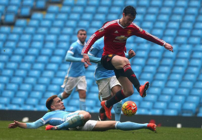 MANCHESTER, ENGLAND - FEBRUARY 20:  Will Keane of Manchester United U21s in action with Kean Bryan of Manchester City U21s during the Barclays U21 Premier League match between Manchester City U21s and Manchester United U21s at Etihad Stadium on February 20, 2016 in Manchester, England.  (Photo by Matthew Peters/Manchester United via Getty Images)
