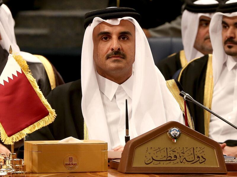 Qatar's Emir Sheikh Tamim bin Hamad al-Thani attends the Gulf Cooperation Council (GCC) summit at Bayan palace in Kuwait City on December 5, 2017.
The Gulf Cooperation Council, which launches its annual summit today in Kuwait amid its deepest ever internal crisis, comprises six Arab monarchies who sit on a third of the world's oil. A political and economic union, the GCC comprises Saudi Arabia, the United Arab Emirates, Kuwait, Qatar, Oman and Bahrain. Dominated by Riyadh, it is a major regional counterweight to rival Iran.
 / AFP PHOTO / Yasser Al-Zayyat