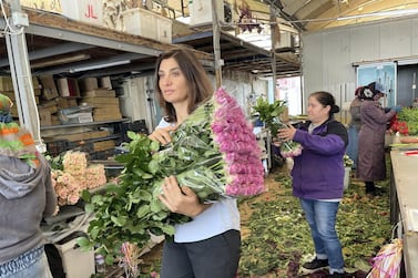 Rania Younes, a flower farmer said that millions of flowers are being dumped each year as consumers shun perishable and luxury goods as they struggle to make ends meet. Mahmoud Rida for The National.