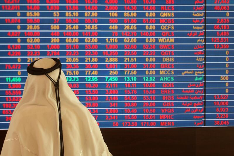 A trader monitors a screen displaying stock information at Qatar Stock Exchange in Doha, Qatar November 9, 2016. REUTERS/Naseem Zeitoon  - RTX2SQ6L