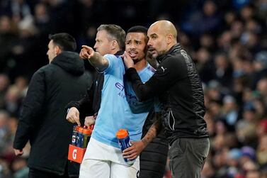Soccer Football - Premier League - Manchester City v Leicester City - Etihad Stadium, Manchester, Britain - December 21, 2019 Manchester City manager Pep Guardiola gives instructions to Gabriel Jesus REUTERS/Andrew Yates EDITORIAL USE ONLY. No use with unauthorized audio, video, data, fixture lists, club/league logos or "live" services. Online in-match use limited to 75 images, no video emulation. No use in betting, games or single club/league/player publications. Please contact your account representative for further details.