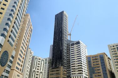 Abbco Tower near the Dubai-Sharjah border was badly damaged in the blaze week. Chris Whiteoak / The National
