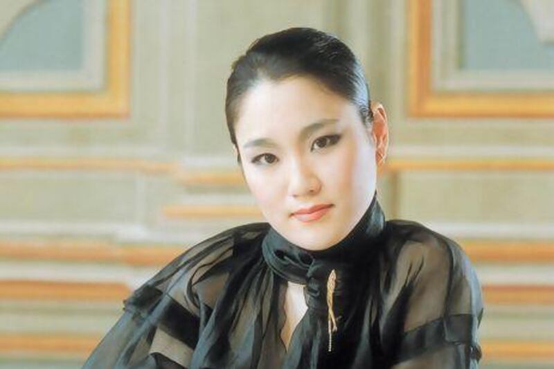 Han-Na Chang has been scaling back solo performances lately to focus on conducting. Courtesy Qatar Philharmonic