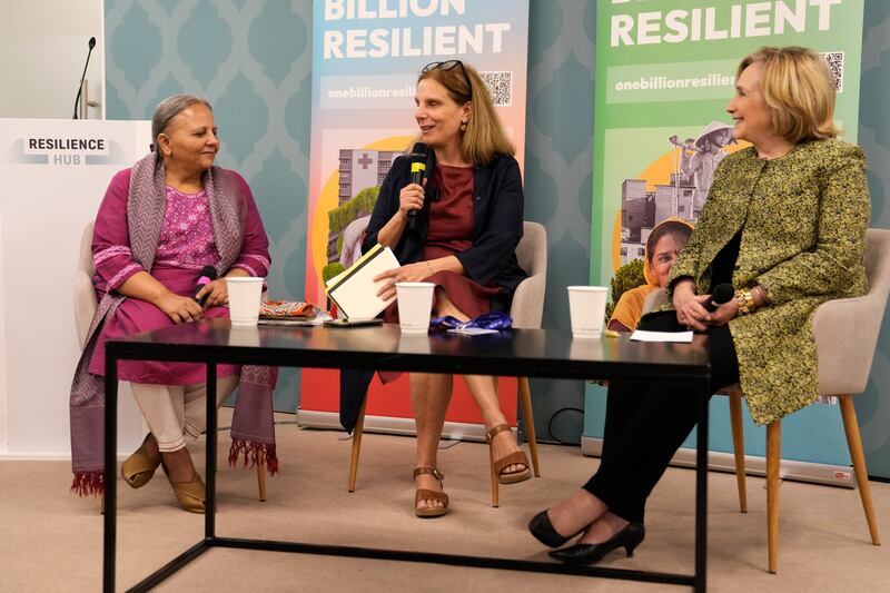 Eleni Myrivili, global chief heat officer at UN Habitat, with former US secretary of state Hillary Clinton and Indian social worker Reema Nanavaty at the Resilience Hub. AP