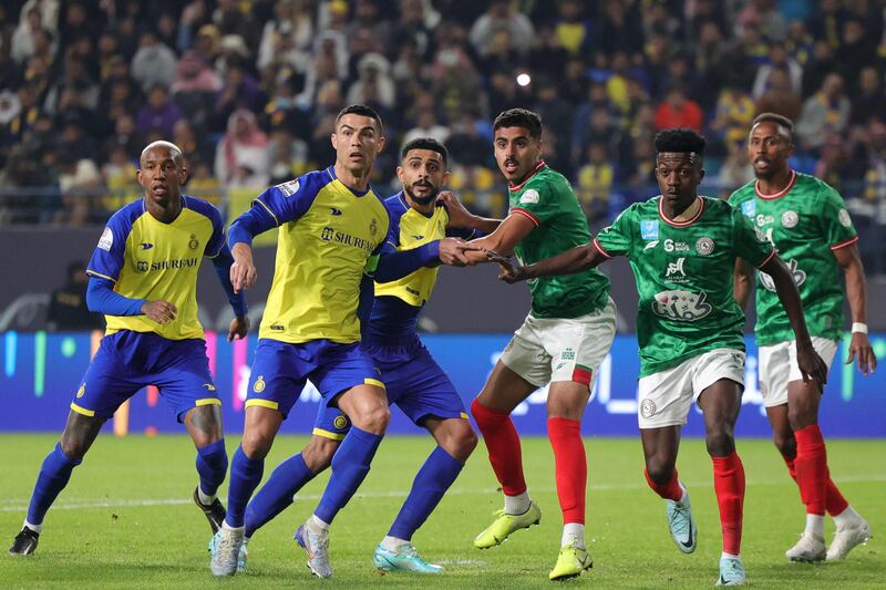 Al Nassr forward Cristiano Ronaldo battles at a corner-kick. AFP