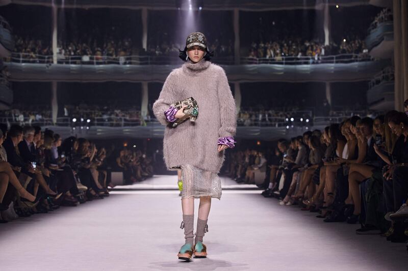 Oversized knits and pops of purple were present throughout Fendi's collection. AFP