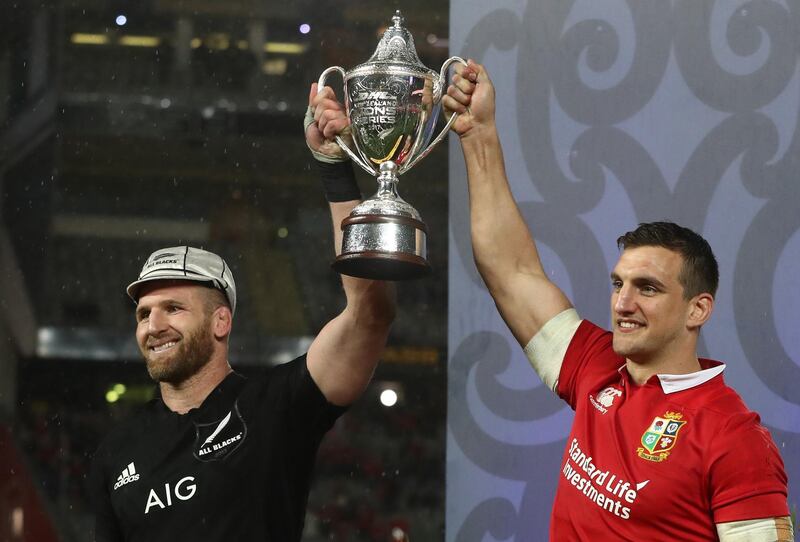 Opposing captains Kieran Read of the All Blacks and Warburton lift the trophy following a drawn series during the third test match between the New Zealand All Blacks and the British & Irish Lions at Eden Park in Auckland, New Zealand, on July 8, 2017. Getty Images